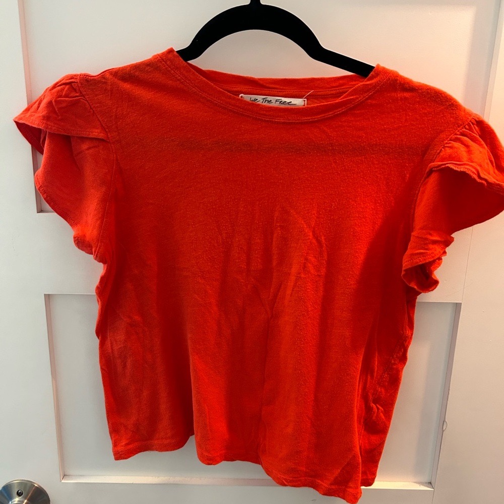 Great tulip sleeve t-shirt from We The Free. Extra small, 100% cotton, orange